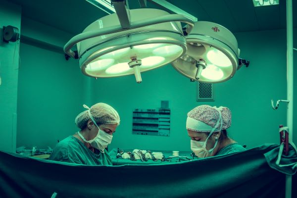 two female surgeons in theatre