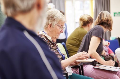 Activity group of people have a cuppa