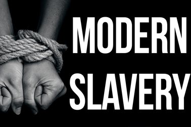 Modern Slavery image of person with hands bound
