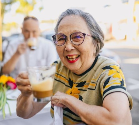 Elderly couple enjoying a cup of coffee