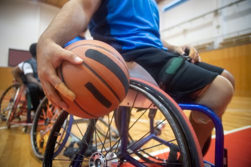 playing wheelchair basketball